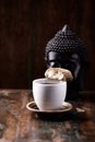 Cantuccini Italian cookie and a Cup of coffee on rustic wooden background