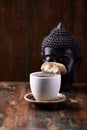 Cantuccini Italian cookie and a Cup of coffee on rustic wooden background