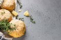 Canvas bag with homemade scone with cheese, thyme and pieces of cheese. Freshly baked delicious English scones.