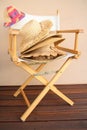 Canvas chair with grass hats Royalty Free Stock Photo