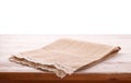 Canvas napkin with lace, tablecloth on wooden table on white background. Can used for display or montage your products Royalty Free Stock Photo