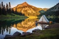 canvas tent on the shore of a quiet mountain lake at sunrise