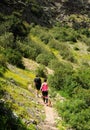 Couple hikers in the Guadiaro river near the Canyon of the Buitreras, Spain