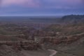 Canyon of the Charyn River in Kazakhstan, Beautiful view of the clay rocks and the road to the gorge at sunset. evening Valley of Royalty Free Stock Photo