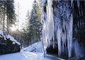 Canyon with a frozen waterfall in winter consisting of huge icicles