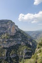 Canyon Gorges de la Nesque, gray cliffs with green forest in summer sunny day in Provence, South France