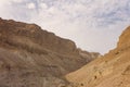 Canyon in the Judean Desert Midbar Yehuda on the dead sea, Israel. Background of lifeless land in the desert on the West Bank of
