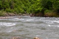 canyon of a mountain river , summer walks in the bosom of nature, rapid flow of water Royalty Free Stock Photo