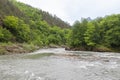 canyon of a mountain river , summer walks in the bosom of nature, rapid flow of water Royalty Free Stock Photo