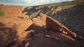 Canyon is revealed behind big rocks at Goosenecks point at Capitol Reef