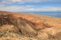 The canyon Skazka (Fairy Tale) and Issyk Kul lake on the background, Kyrgyzstan