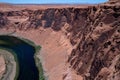 Canyon Travel Lifestyle adventure. Landscape of Horseshoe Bend with sunrise and reflecting surface of Colorado River Royalty Free Stock Photo