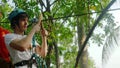 Thailand, Koh Samui, 26 january 2016. Canyoning instructor explains the tourist man how to hold onto a slingshot on a