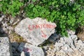 Canyoning sign on a stone, written in red, just above Cikola river, in Croatia. Adventure concept