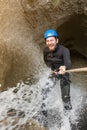 Canyoning in waterfall Royalty Free Stock Photo