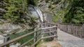 Canyoning waterfall view from a wooden bridge trees on both sides, Maltatal, Austria Royalty Free Stock Photo