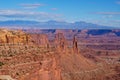 The Canyonland Landscape with Snow Covered Mountains in the Background