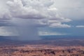 Canyonlands - Dark clouds accumulating to rain storm over Split Mountain Canyon seen from Grand View Point Overlook, Utah, USA Royalty Free Stock Photo