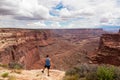 Canyonlands - Man with scenic view from Shafer Trail Viewpoint in Canyonlands National Park near Moab, Utah, USA Royalty Free Stock Photo
