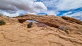 Canyonlands - Scenic view through Mesa Arch near Moab, Canyonlands National Park, San Juan County, Southern Utah, USA Royalty Free Stock Photo