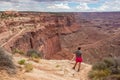 Canyonlands - Woman with scenic view from Shafer Trail Viewpoint in Canyonlands National Park near Moab, Utah, USA Royalty Free Stock Photo