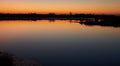 Caorle at sunset: beautiful winter sunset in the Venetian lagoon of Caorle, Venice, Italy