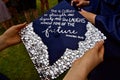 Cap of a high school grad with a Bible verse