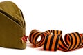 Cap with red star and George ribbon, headdress serviceman Red Army Soviet Union, on white background