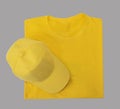 Cap and T-shirt yellow empty top view Royalty Free Stock Photo