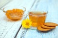 The cap of tea with coocies and orange jam Royalty Free Stock Photo