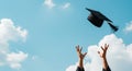 Cap toss signifies student freedom. Sky backdrop enhances this freedom. Pure freedom Royalty Free Stock Photo