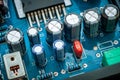 Capacitance and electrical components inside audio power amplifier Royalty Free Stock Photo