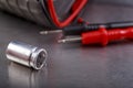Capacitor and electrical meter. Measurement work in an electrical workshop Royalty Free Stock Photo