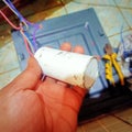 The capacitor in the washing machine is to provide additional electrical power so that the dynamo can rotate