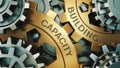 Capacity Building - Concept. The inscription on the golden cogwheels. In the background is a clock or engine mechanism. 3d Royalty Free Stock Photo