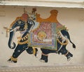 Caparisoned elephant painting on courtyard wall Royalty Free Stock Photo