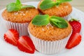 Capcake with mint and strawberries Royalty Free Stock Photo