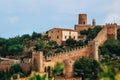 Capdepera castle on green hill in Mallorca island, Spain.