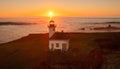 Cape Arago Lighthouse at the Oregon Coast at sunset. Royalty Free Stock Photo