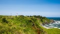 Cape Blanco Lighthouse and rocky coastline Royalty Free Stock Photo