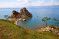 Cape Burhan, Shamanka or Shaman Rock in summer day. Lake Baikal, Olkhon Island. Royalty Free Stock Photo