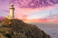 Cape Byron lighthouse in New South Wales in Australia at dramatic sunset Royalty Free Stock Photo