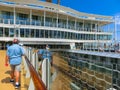 Cape Canaveral, USA - April 29, 2018: The passenger flying at zip line at cruise liner or ship Oasis of the Seas by Royalty Free Stock Photo