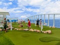 Cape Canaveral, USA - April 30, 2018: The upper deck with mini golf court at cruise liner or ship Oasis of the Seas by Royalty Free Stock Photo