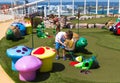 Cape Canaveral, USA - April 30, 2018: The upper deck with .mini golf court at cruise liner or ship Oasis of the Seas by Royalty Free Stock Photo