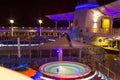 Cape Canaveral, USA - May 02, 2018: Open deck in the night time. Giant cruise ship Oasis of the Seas by Royal Caribbean. Royalty Free Stock Photo