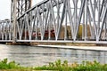 Cape cod railroad bridge with a train crossing Royalty Free Stock Photo