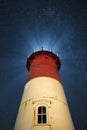 Vertical low angle shot of a lighthouse in Nauset Light, Wellfleet, MA at night
