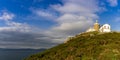 Cape Finisterre Lighthouse in warm morning light Royalty Free Stock Photo