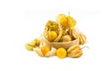 Cape gooseberry put in wood bowl physalis isolated on white background Royalty Free Stock Photo